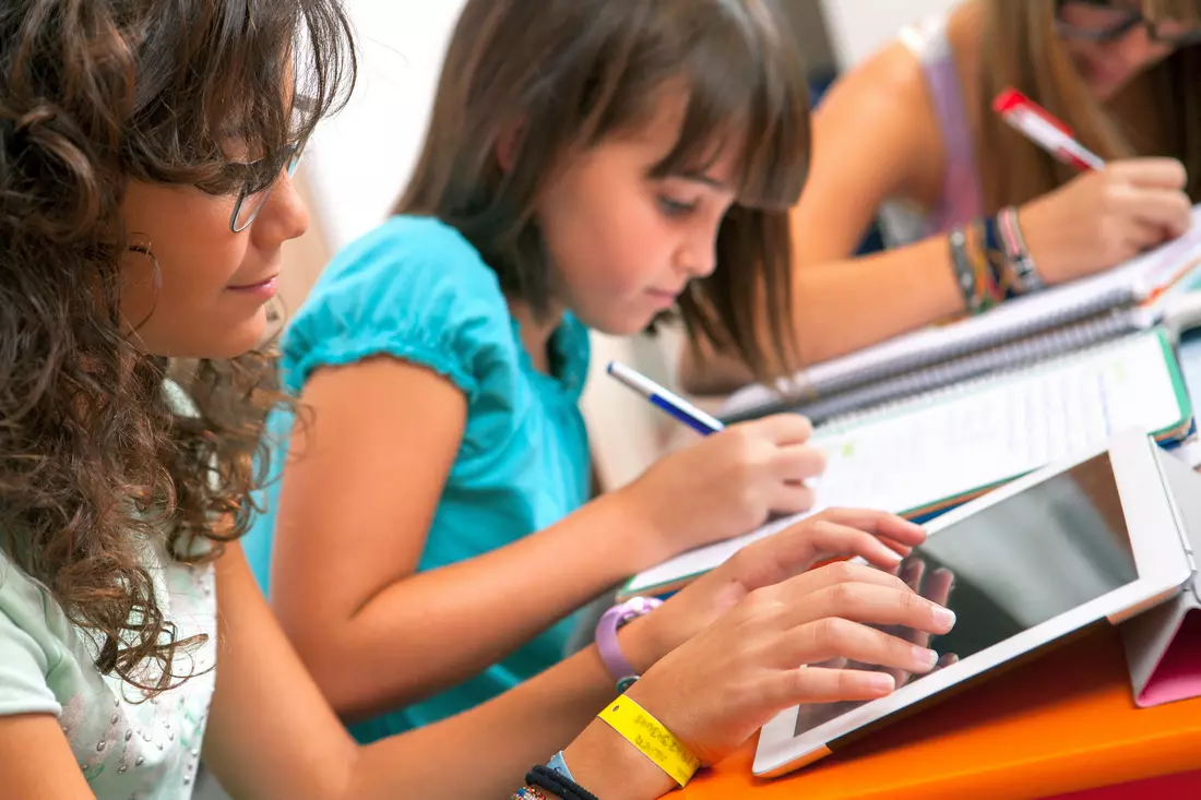 Gulliver Preparatory School in Miami — students using technology in class Gulliver Preparatory School students using a tablet in class — American Butler