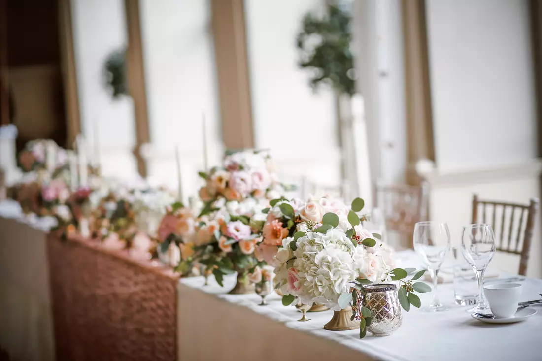 Beautiful flowers and decorative elements create an atmosphere of romance and celebration at your wedding Wedding decorations at a restaurant in Miami