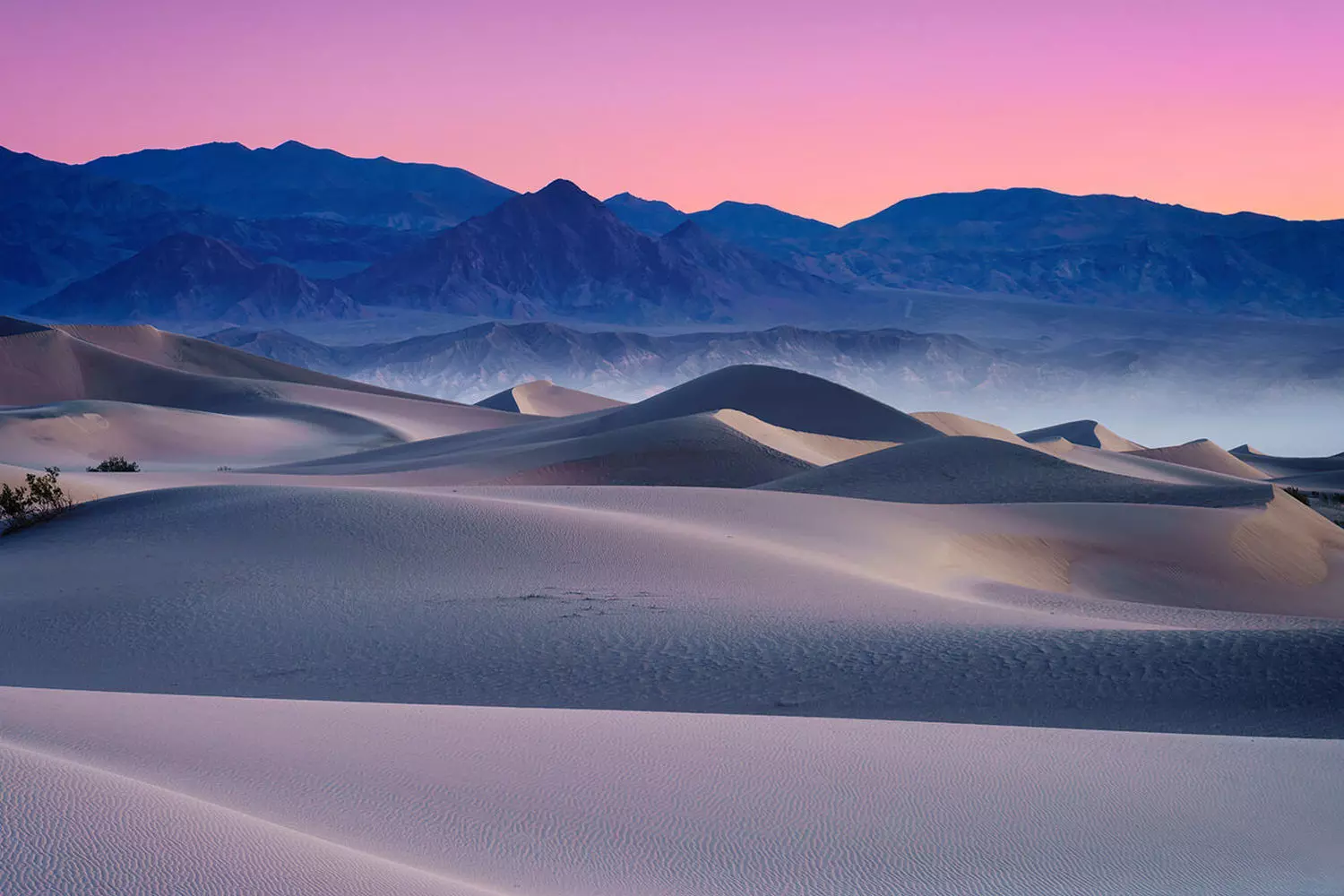 Magical Sunset in Death Valley — When the Desert Turns to Fire Sunset in Death Valley: golden sands and crimson mountains bathed in fading light