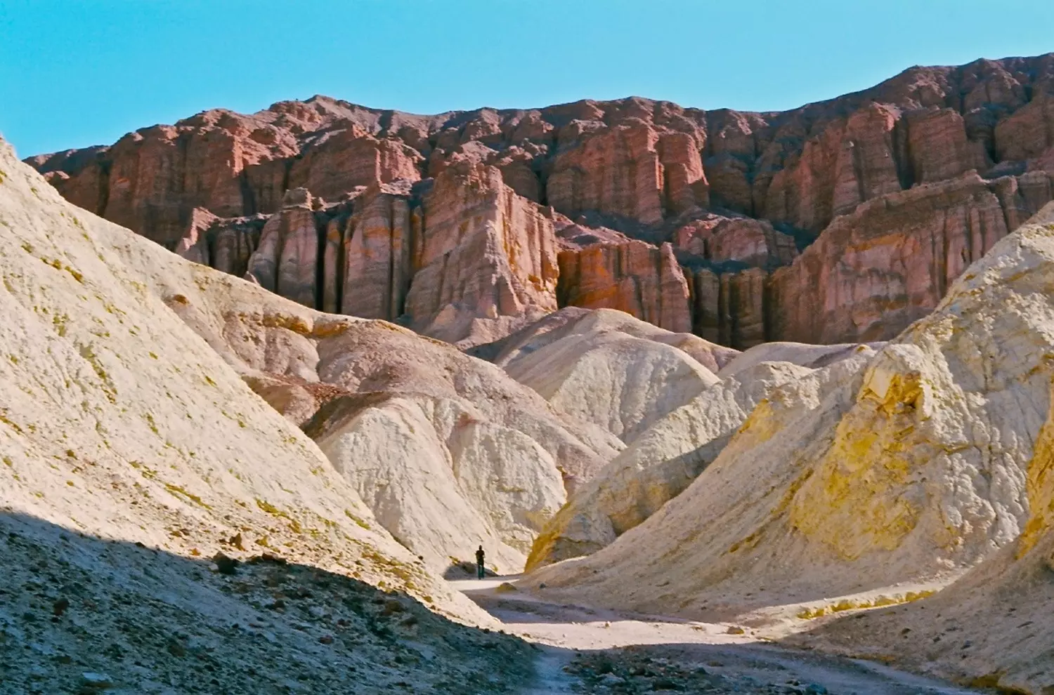 Death Valley Mountains — Colorful Cliffs & Martian Landscapes Dramatic mountain ranges of Death Valley: wind-carved layered rocks under the desert sun