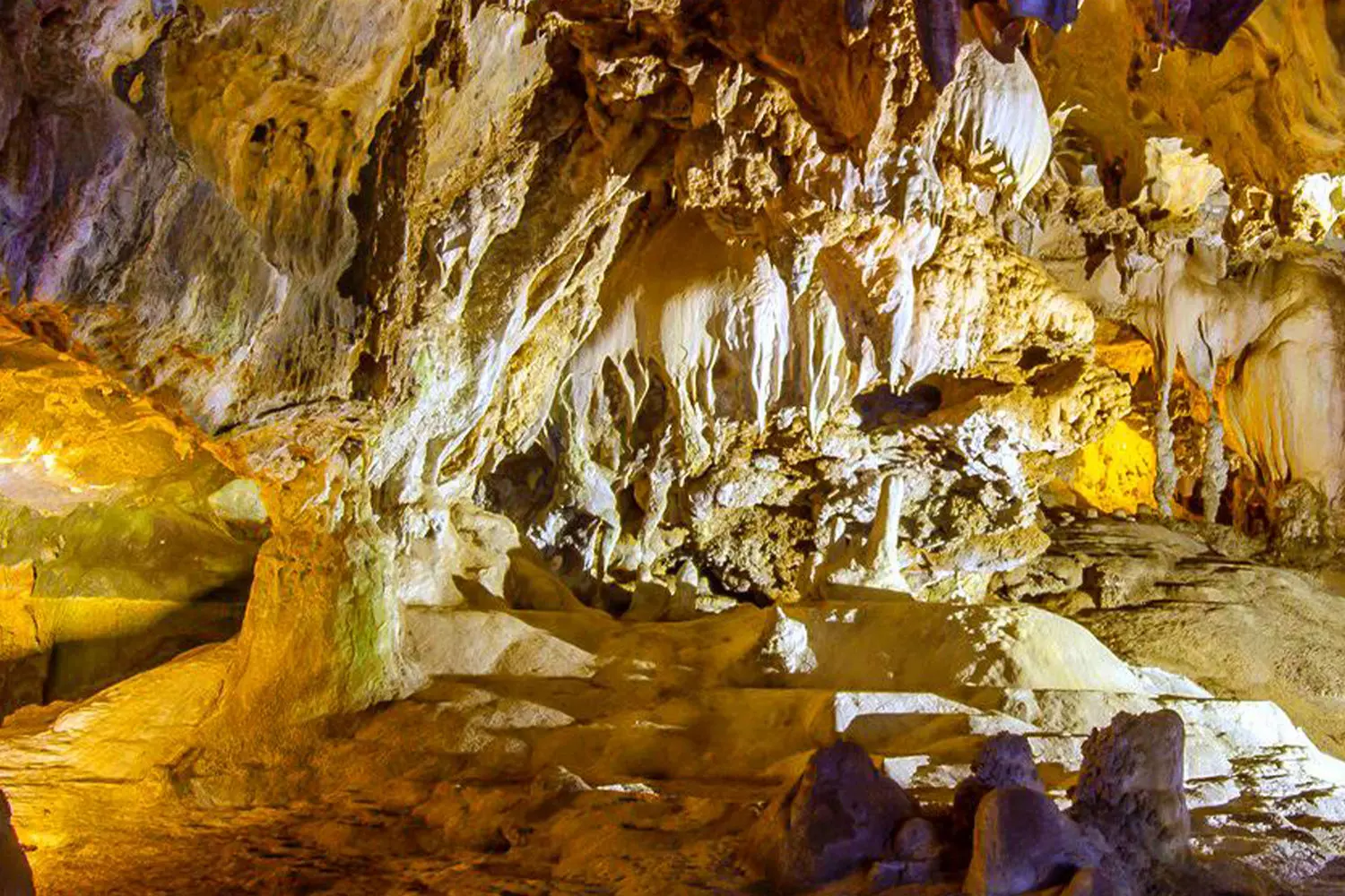 Crystal Cave: The Hidden Jewel of Sequoia Park Explorers walking through marble cave formations with stalactites in Sequoia National Park