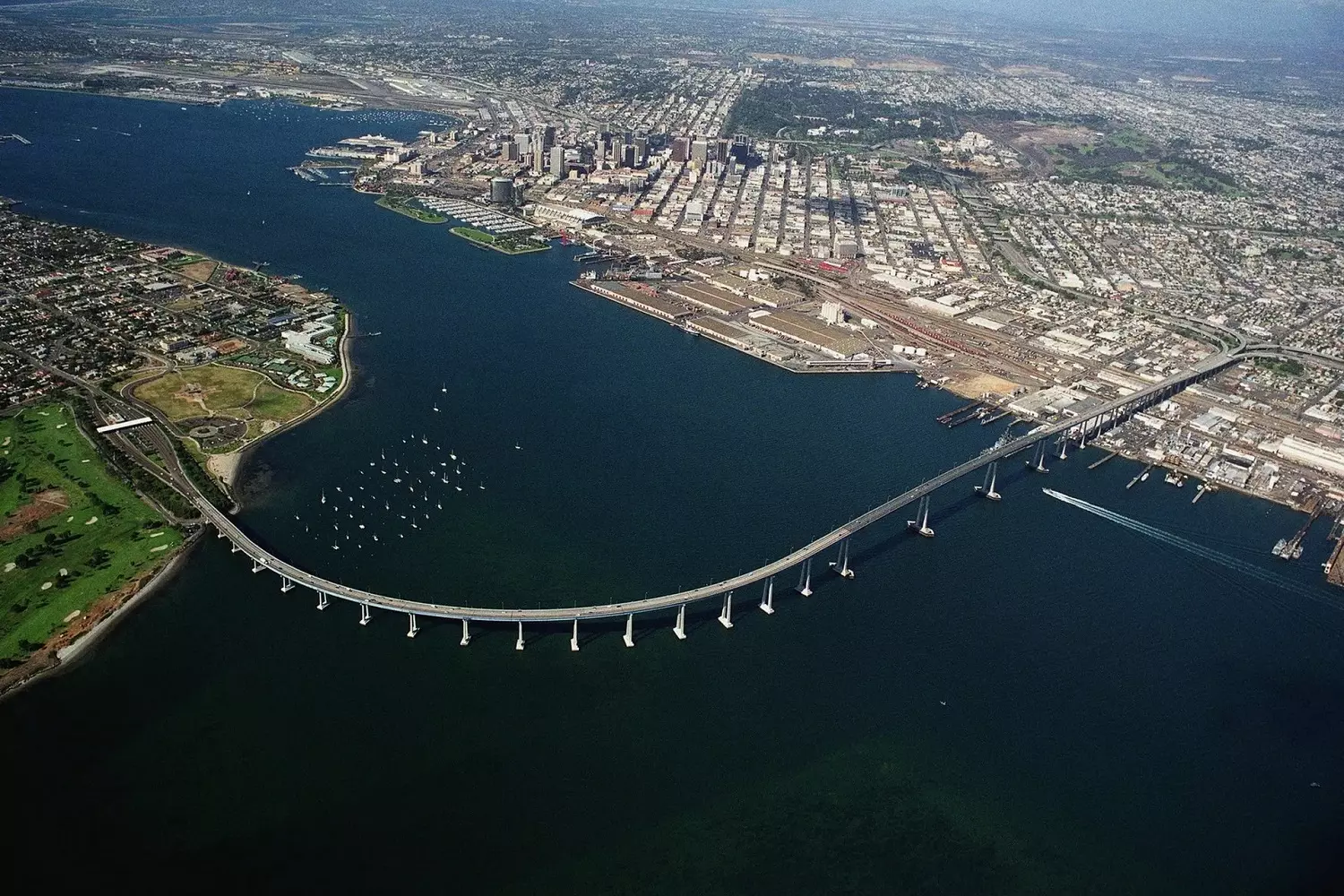 The Coronado Bridge against the backdrop of San Diego Bay A view of the Coronado Bridge connecting San Diego to Coronado Island