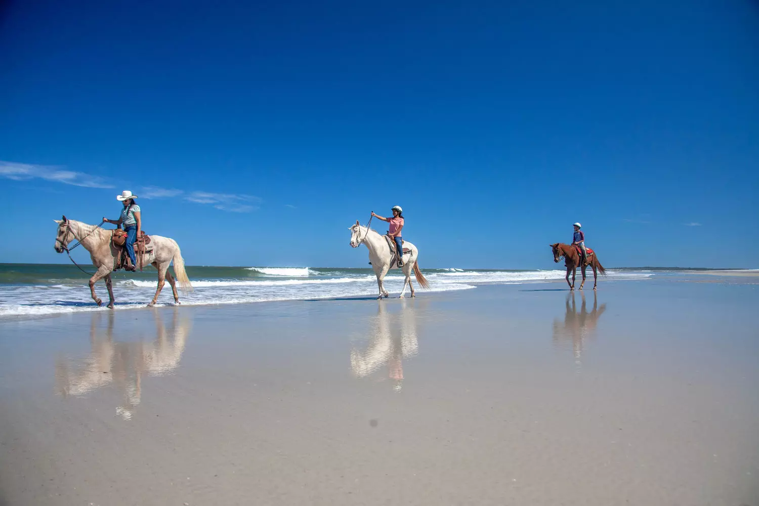 Horseback Riding Along the Shores of Amelia Island Horseback riding on the sandy beach of Amelia Island State Park