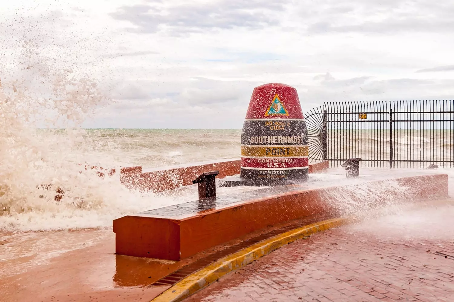 Southernmost Point Buoy in Key West Southernmost Point Buoy in Key West with the ocean in the background