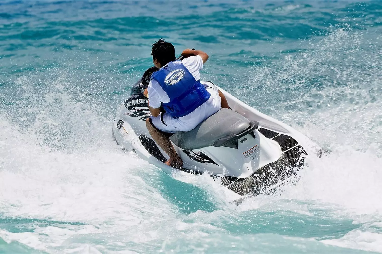Jet Ski Rental in Miami — Thrill & Fun on the Water Jet skis on turquoise water near Miami coastline under bright sun