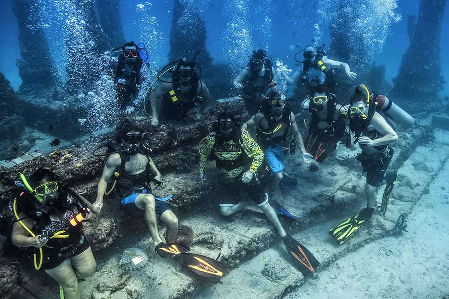 Miami Scuba Diving — Discover Tropical Marine Life Scuba divers exploring vibrant coral reefs in Miami waters