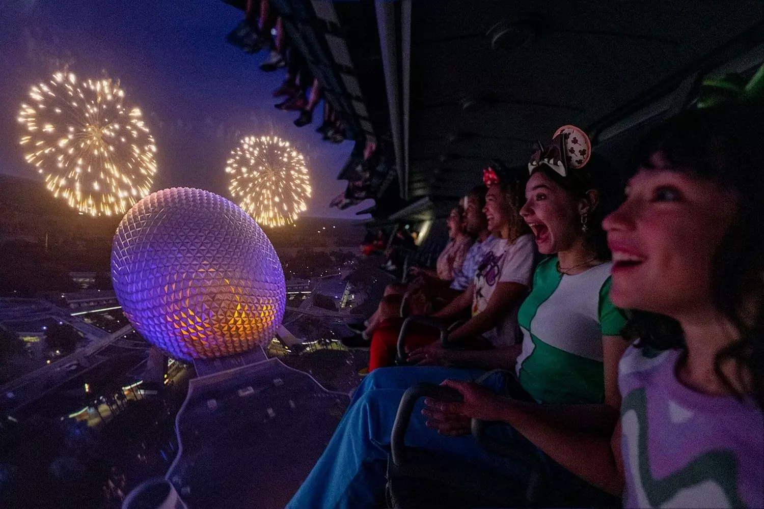 EPCOT nighttime spectacular — a breathtaking display of lights, music, and fireworks Evening fireworks and light show over the lagoon at EPCOT