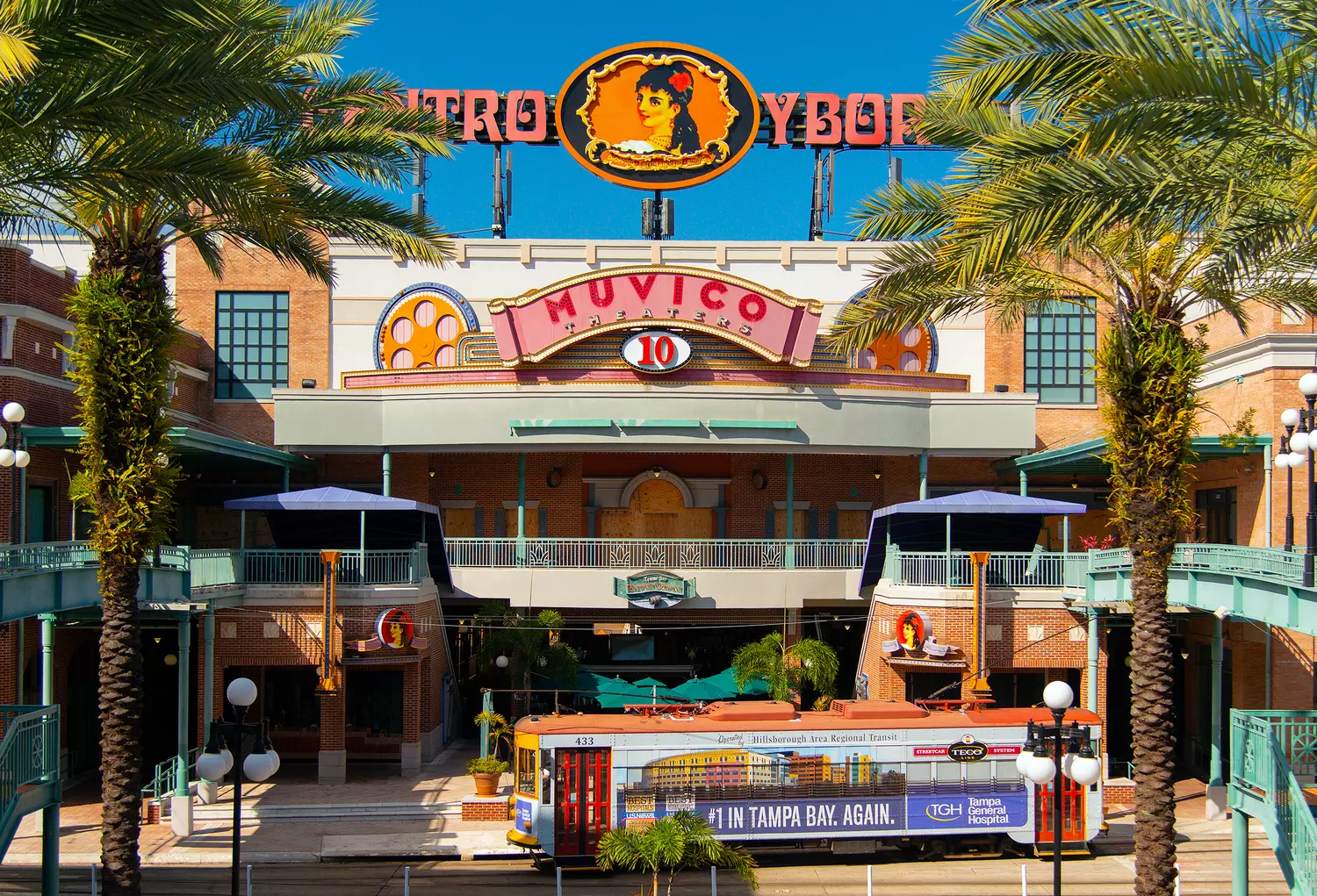 Ybor City, Tampa — Historic Charm & Vibrant Streets A scenic view of Ybor City in Tampa, featuring historic brick buildings, colorful streets, and vintage charm under a sunny sky