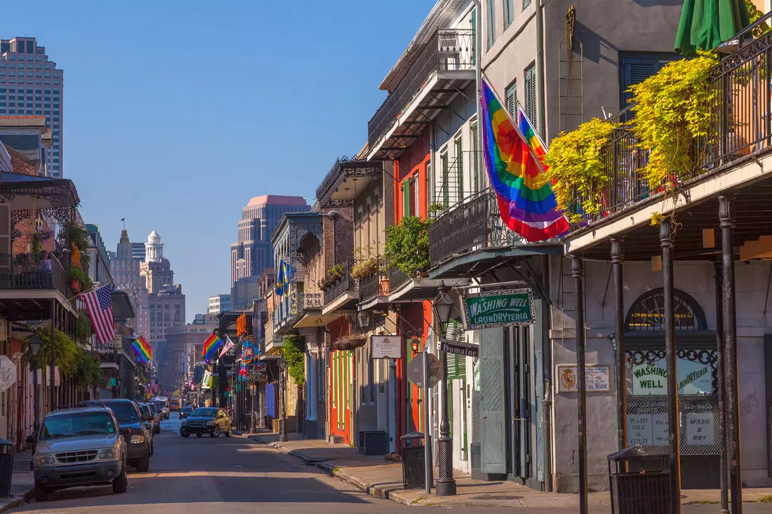 A Walk Through the French Quarter — The Historic Heart of New Orleans The French Quarter in New Orleans with colorful buildings and flags