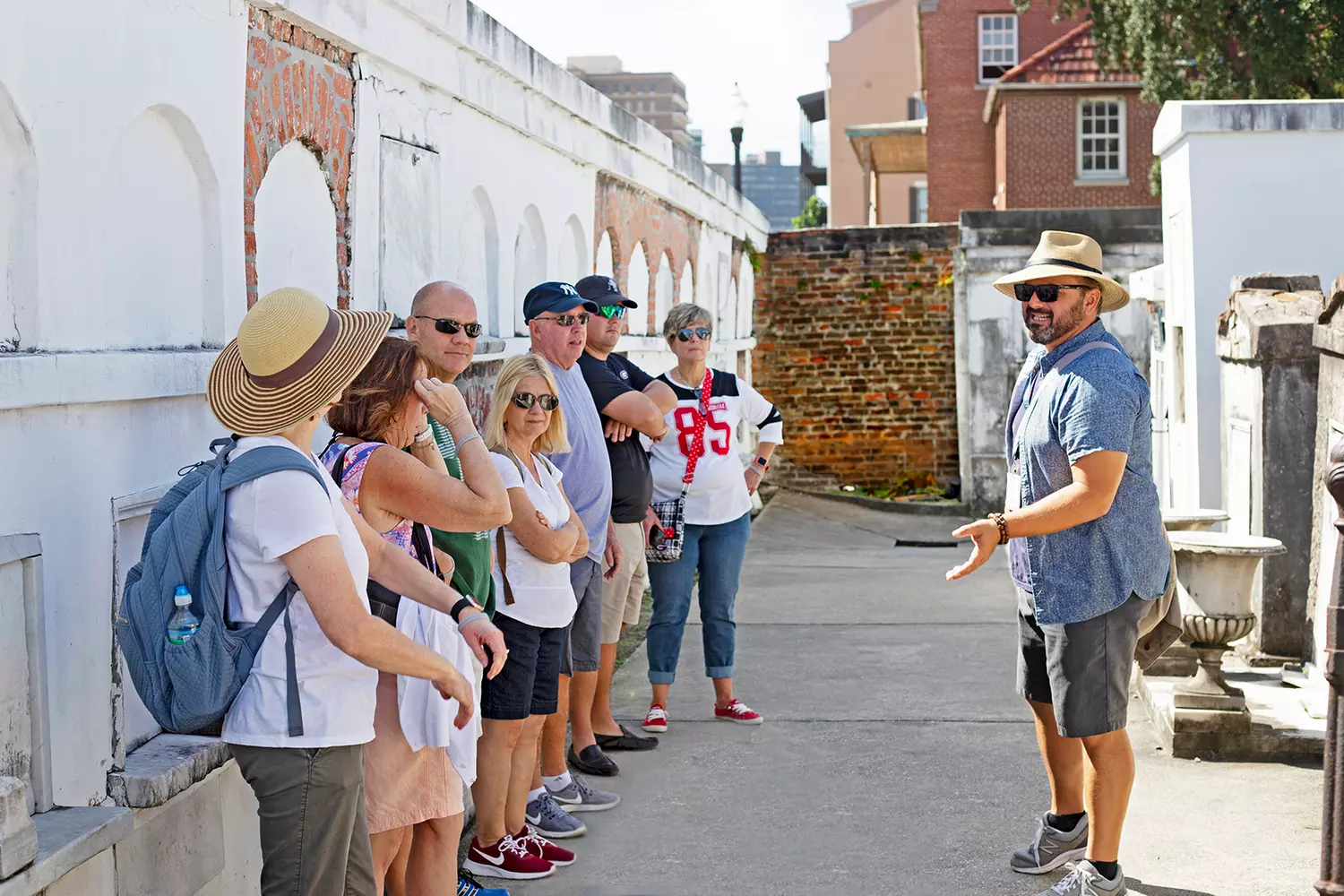 New Orleans Walking Tour — Group of Tourists on a Walk New Orleans Walking Tour — Photo of a group of tourists on a walk — American Butler