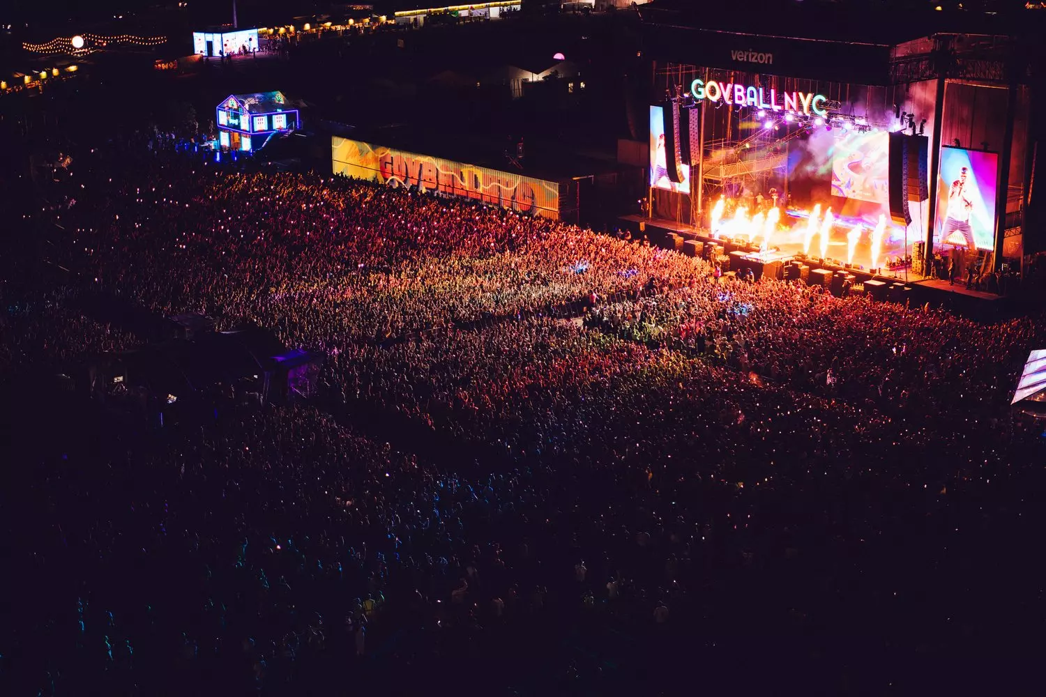 Night view of the Governors Ball Festival Illuminated stage and crowd at Governors Ball in New York City at night