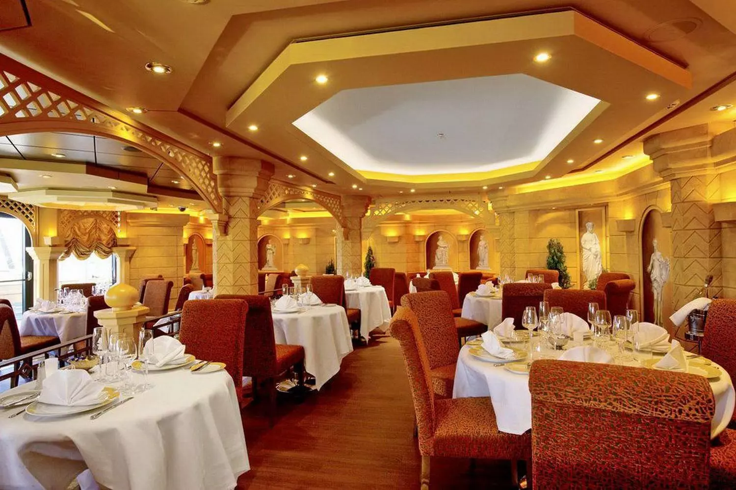 MSC Divina Restaurant — Gourmet Dining at Sea Elegant restaurant onboard MSC Divina cruise ship with fine dining tables and ocean views