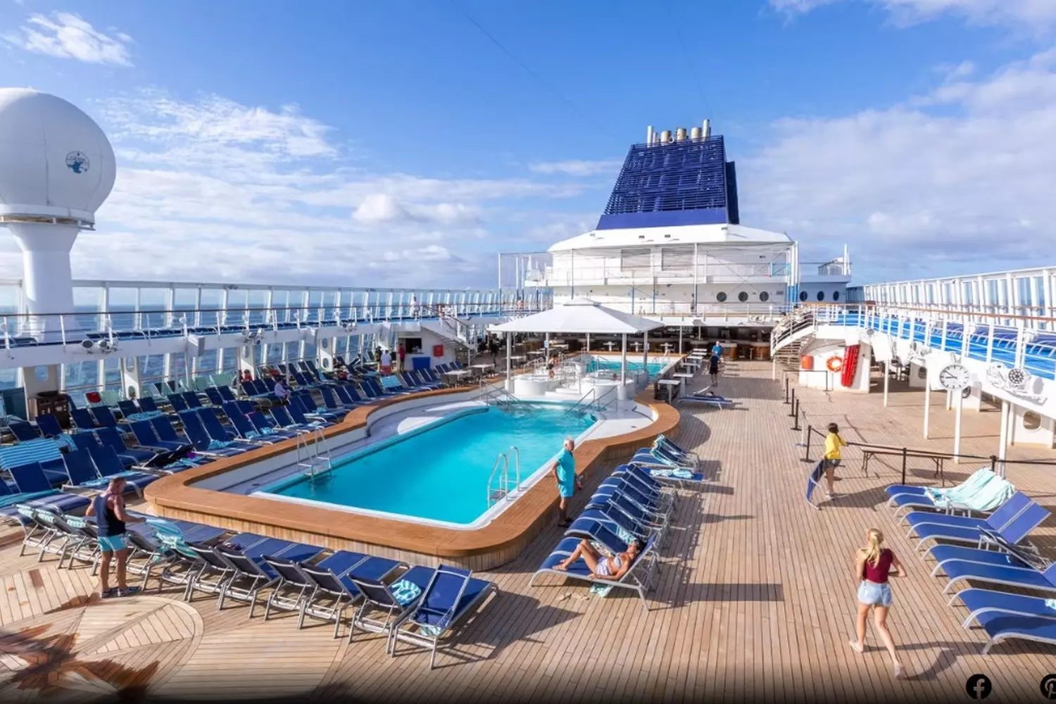 Norwegian Sun Deck Pool — Relaxation Under the Sun Norwegian Sun cruise ship's deck pool area with crystal-clear water, sun loungers, and tropical atmosphere under blue skies
