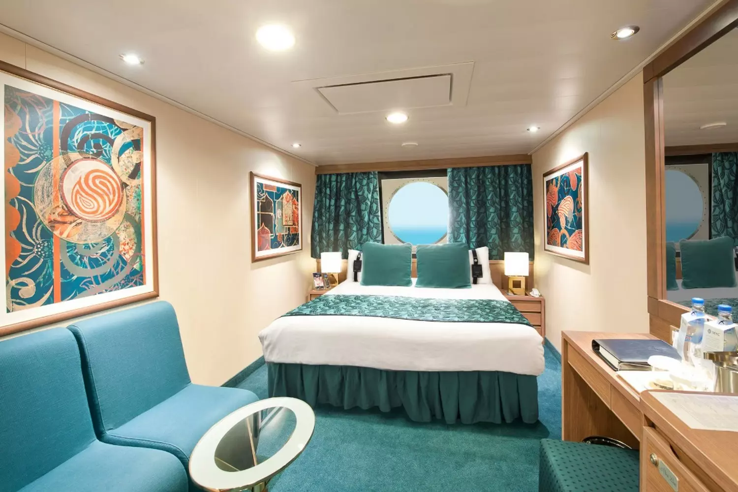 MSC Poesia Cabin — Luxury Cruise Accommodation with Stylish Design Elegant cabin onboard MSC Poesia cruise ship with comfortable bed, modern decor, and ocean view