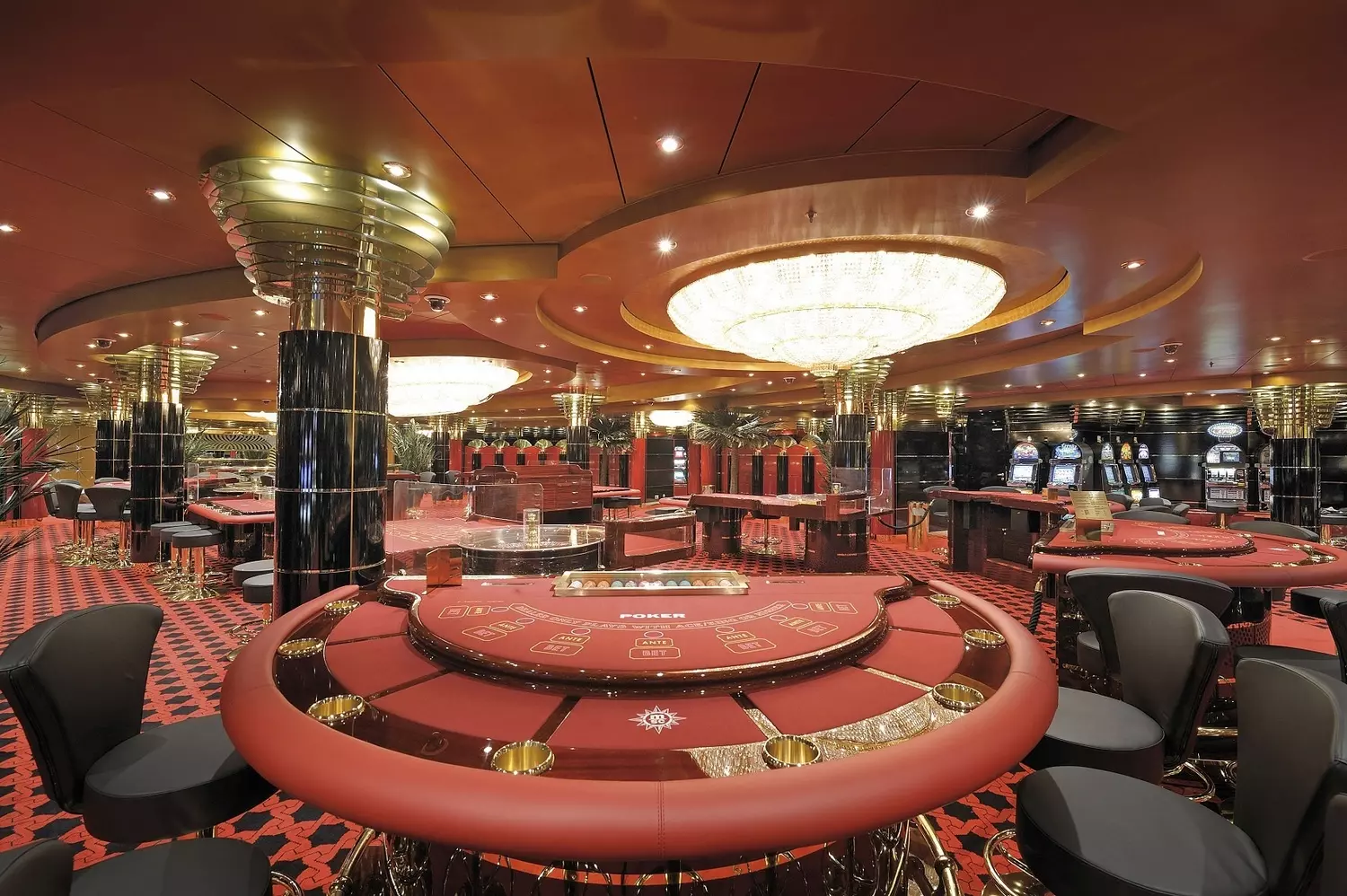 MSC Poesia Casino — Exciting Games & Nightlife at Sea Vibrant casino aboard MSC Poesia cruise ship with slot machines, gaming tables, and elegant lighting