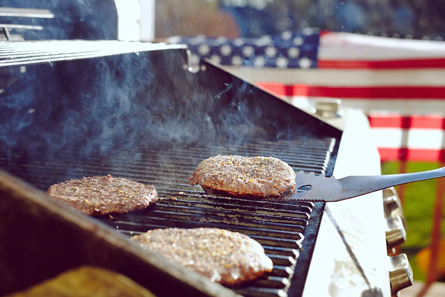 Labor Day in the USA — American May Day | American Butler Photos of grilled patties on Labor Day in the US — American May Day