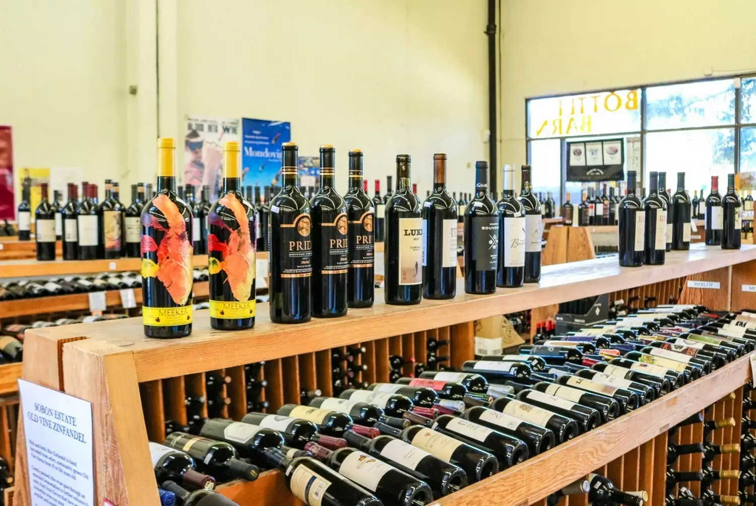 American Wine Aisles: Exploring the Best of US Winemaking Well-stocked American wine display featuring premium California Cabernets, Oregon Pinot Noirs, and regional specialties in a stylish retail setting