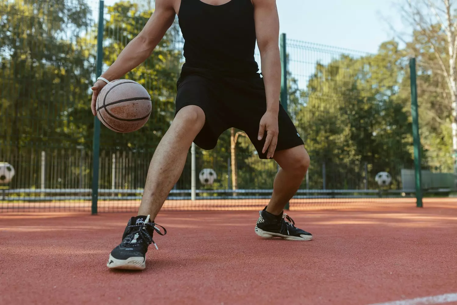 A man playing basketball A man playing basketball
