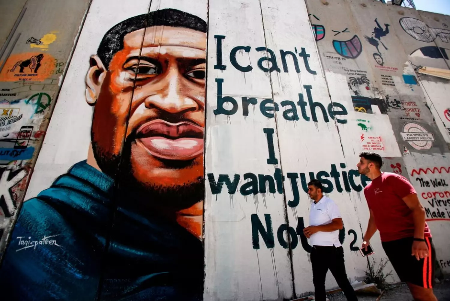 Street Art as a Voice for Justice: The Powerful George Floyd Mural A vibrant mural of George Floyd on a city wall, symbolizing the fight against racial injustice and the impact of the Black Lives Matter movement