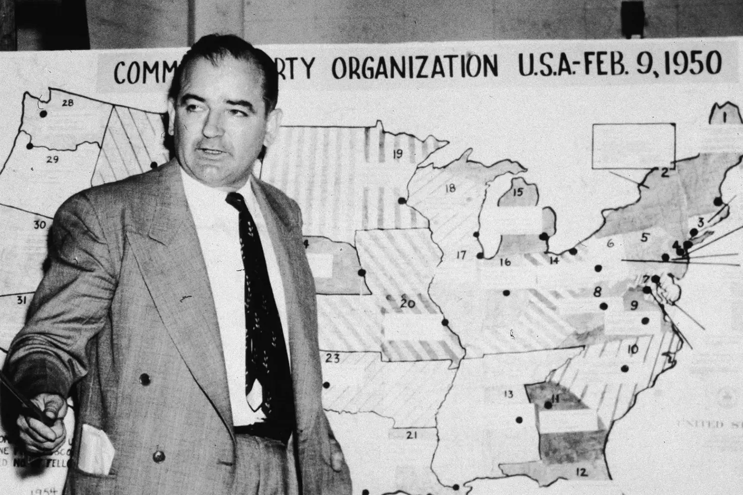 McCarthyism: The “Witch Hunt” Era of the Cold War Black-and-white photo of Senator McCarthy accusing "communists" during hearings — a symbol of political repression in 1950s America