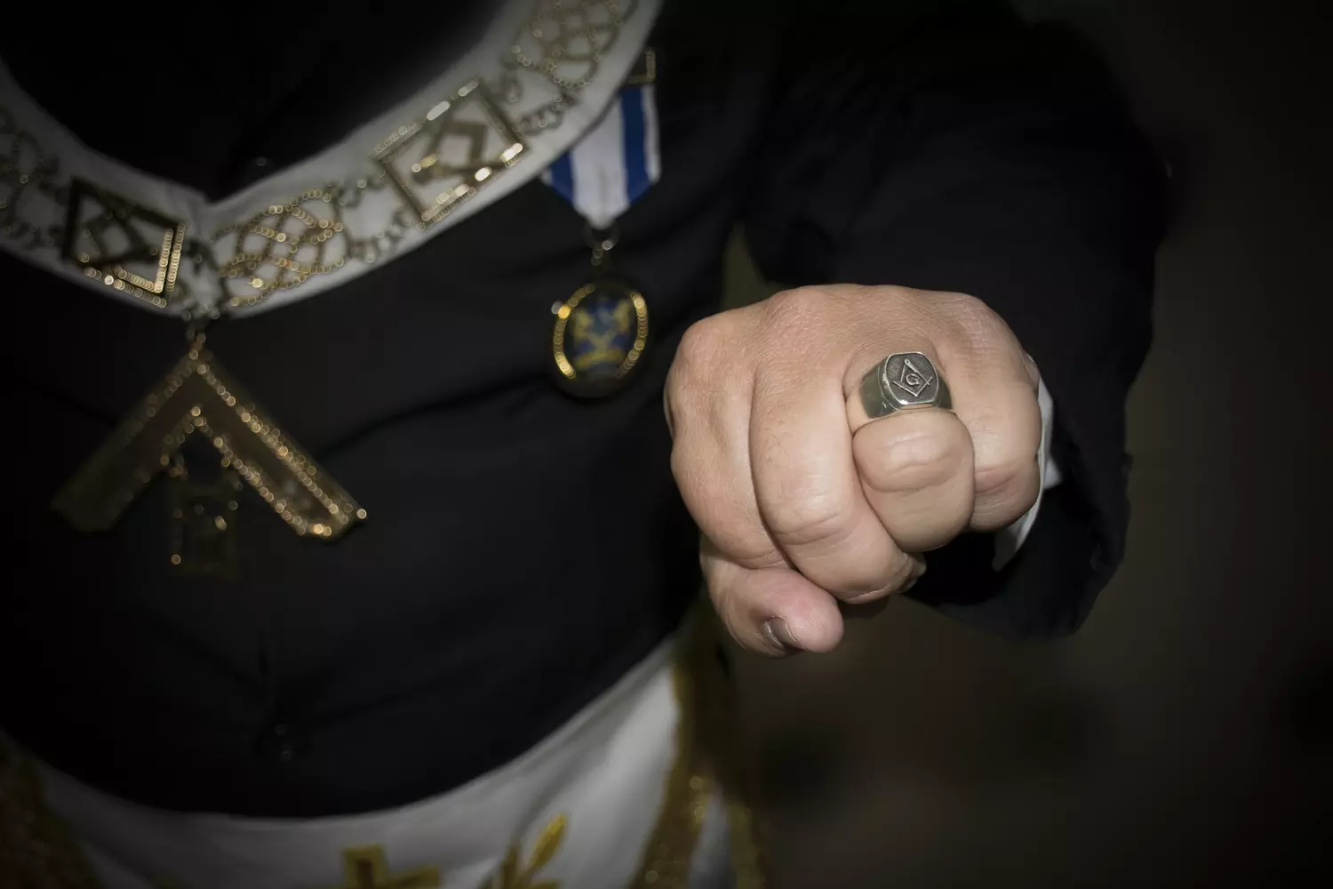Masonic symbols — a ring on a lodge member's hand | American Butler Masonic ring on the hand of a lodge member