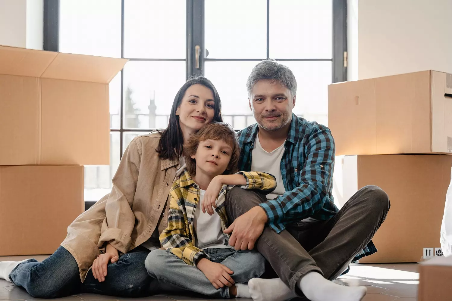 Happy family in a new apartment Photo of a happy family that purchased an apartment