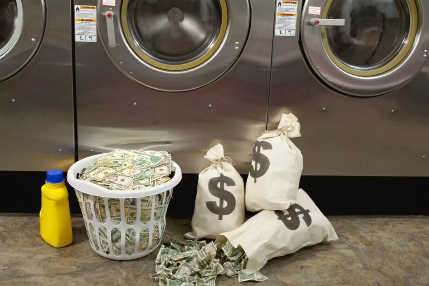 More Than Just Spin Cycles: Why American Laundromats Are Cultural Icons A vibrant laundromat in the USA with rows of washing machines, folding tables, and a cozy atmosphere — where laundry meets community