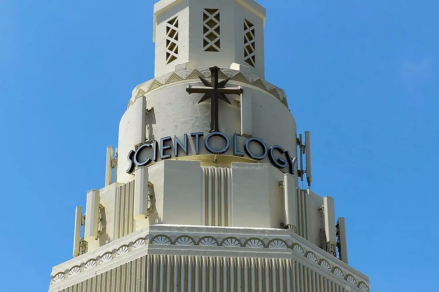 The Church of Scientology: A Modern Religious Movement A striking building of the Church of Scientology, featuring its iconic architecture and symbol, representing one of the most controversial religious movements of the 21st century