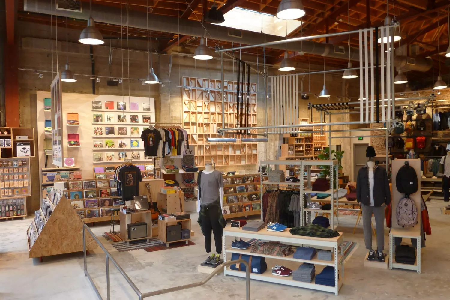 Where Hipster Heaven Meets Street Style Urban Outfitters Store Interior: Vintage band tees, Y2K-inspired decor, neon signage, and neatly displayed streetwear racks