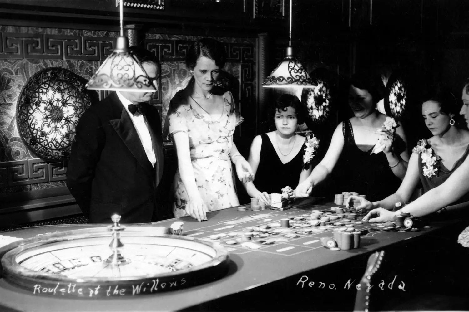 Old Nevada casino in a historical photo Historic photograph of a casino in Nevada, showcasing vintage architecture and signage