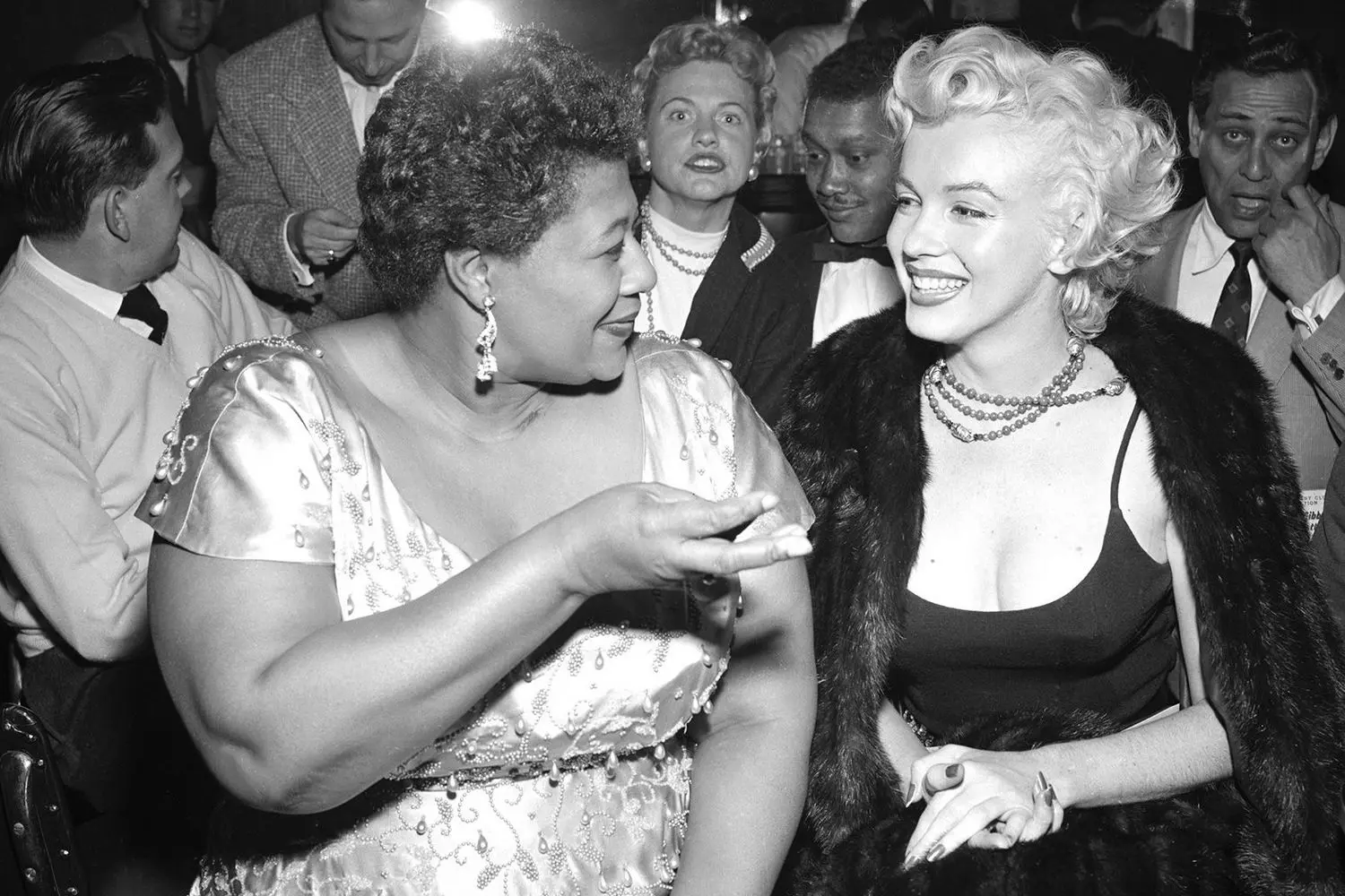 Jazz icon Ella Fitzgerald with Hollywood star Marilyn Monroe Ella Fitzgerald and Marilyn Monroe together at an event