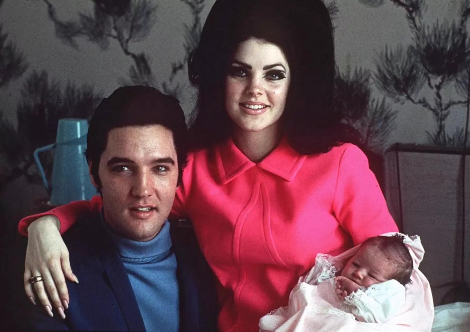 A tender family moment: Elvis Presley with his wife Priscilla and their newborn daughter Lisa Marie Elvis Presley with Priscilla and newborn Lisa Marie