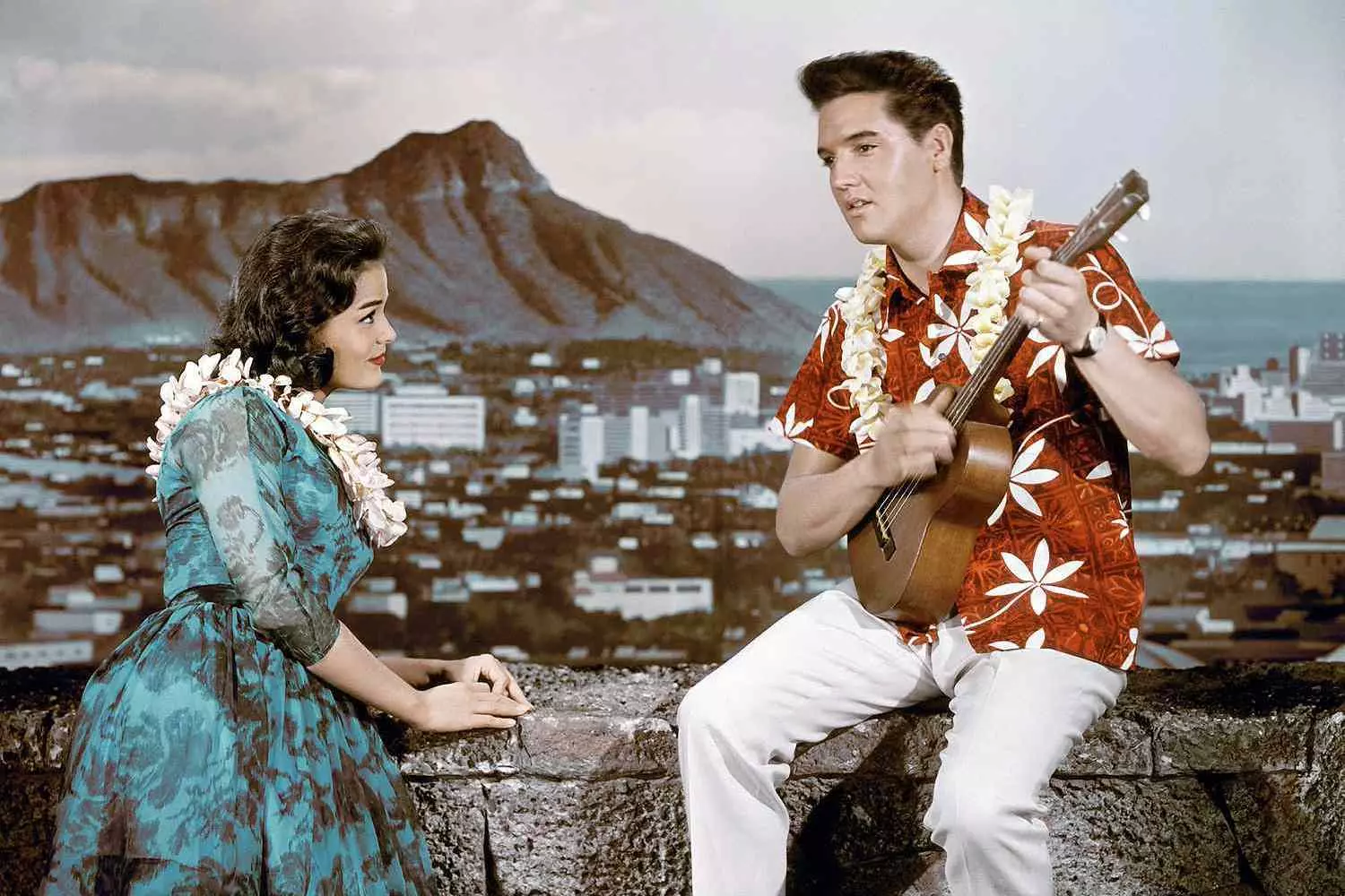 Elvis Presley in a movie scene Elvis Presley in one of his iconic film roles — the golden era of Hollywood and rock ‘n’ roll