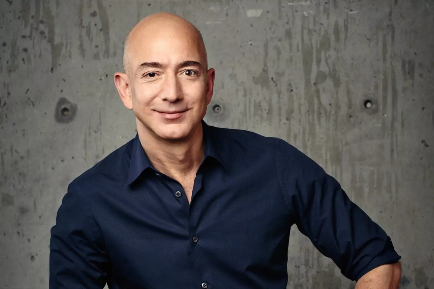 Jeff Bezos posing for a professional photo Jeff Bezos posing for a professional photo