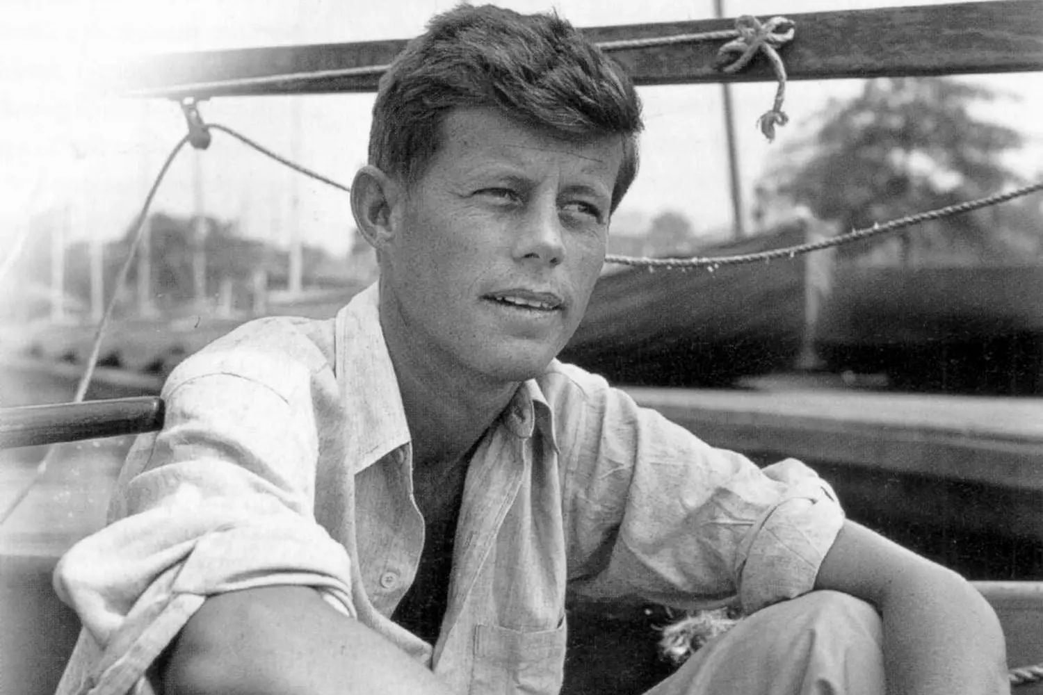 War and First Recognition: JFK's Early Path to Prominence Black-and-white photo of a young John F. Kennedy during his Harvard years or shortly after graduation (late 1930s — early 1940s), before his political career began