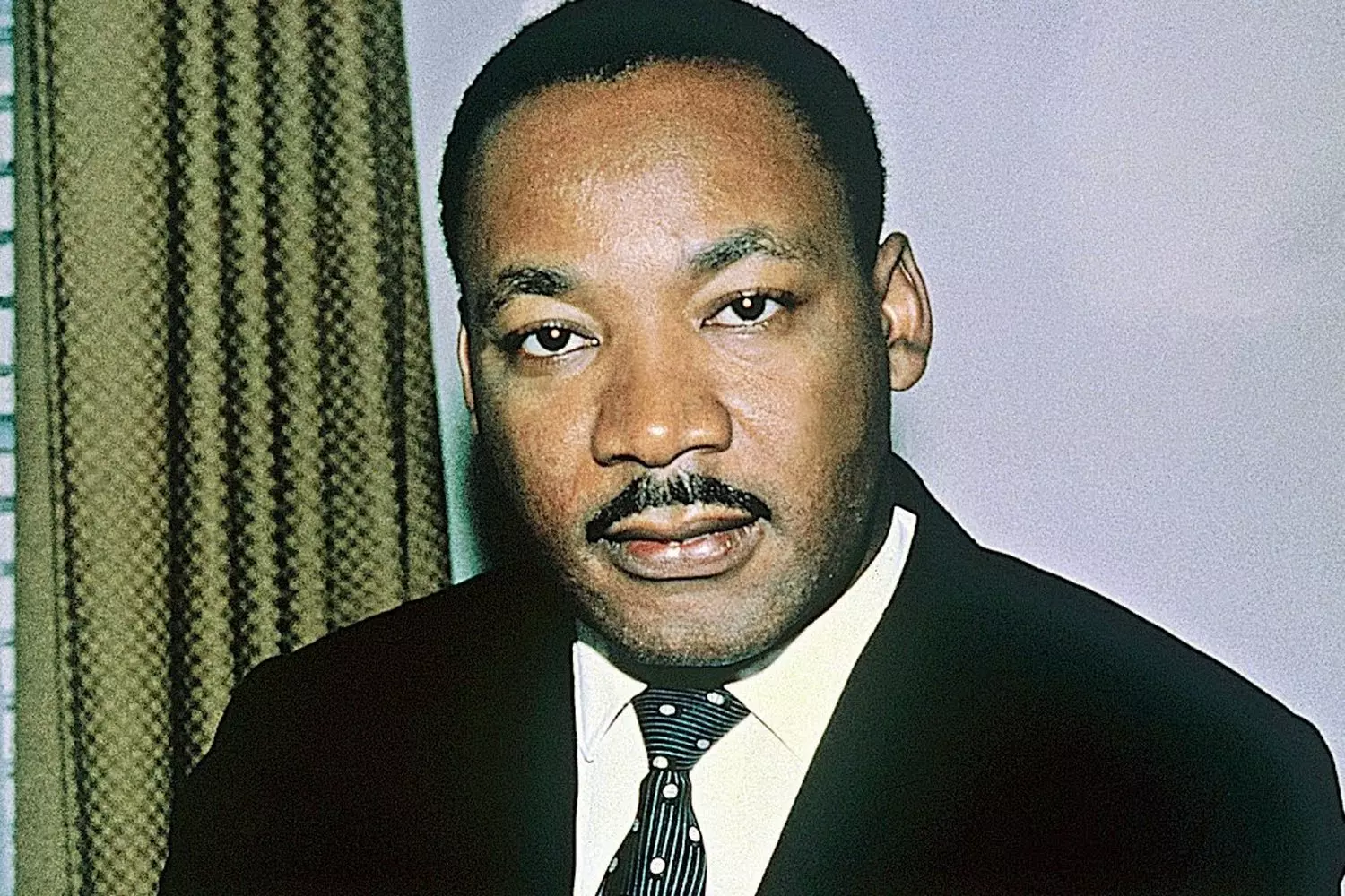 Martin Luther King Jr.: Portrait of a Civil Rights Icon Close-up portrait of Martin Luther King Jr.: piercing eyes, confident gaze and distinctive features