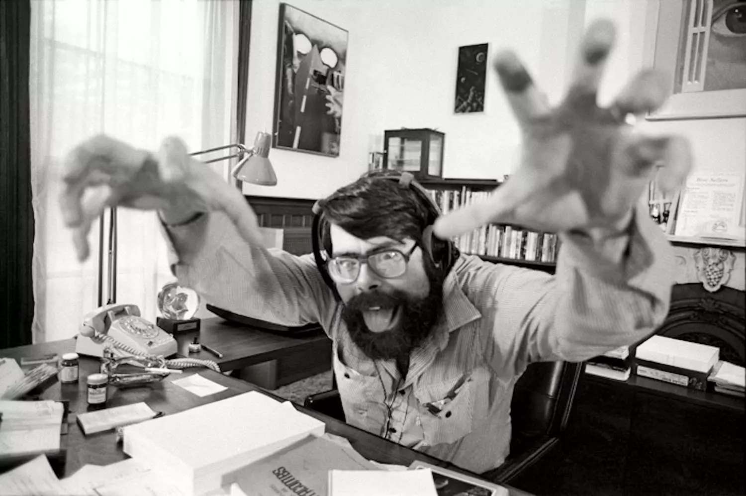 Young Stephen King at Work: The Early Days of a Horror Legend A rare photo of young Stephen King writing at his desk, fully immersed in crafting his dark stories that would later terrify millions
