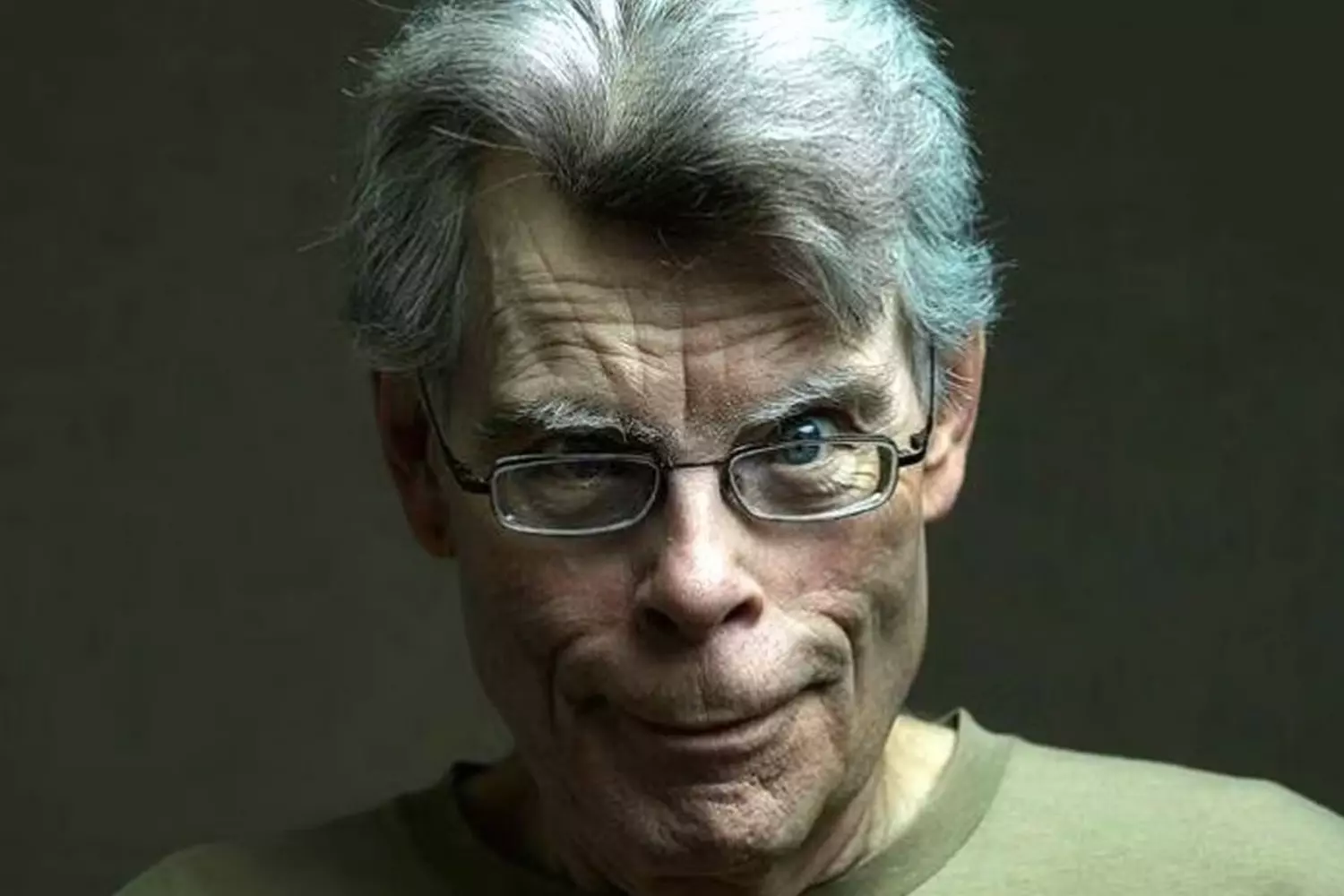Stephen King: The Master of Modern Horror Close-up portrait of Stephen King, the legendary horror writer, with intense gaze and signature glasses