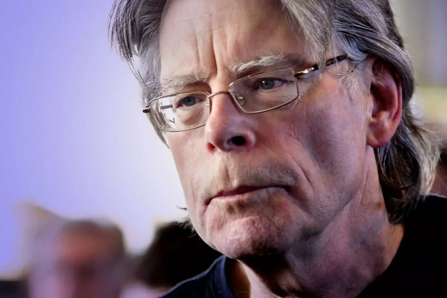 Stephen King: The Master of Modern Horror Close-up portrait of Stephen King, the legendary horror writer, with intense gaze and signature glasses