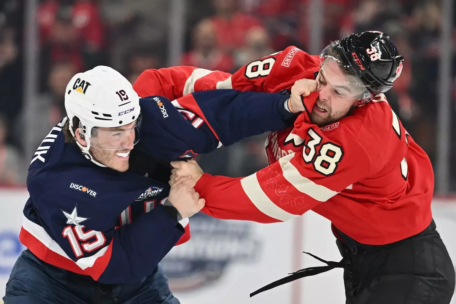 Hockey players in a scuffle during a game Hockey players in a scuffle during a game