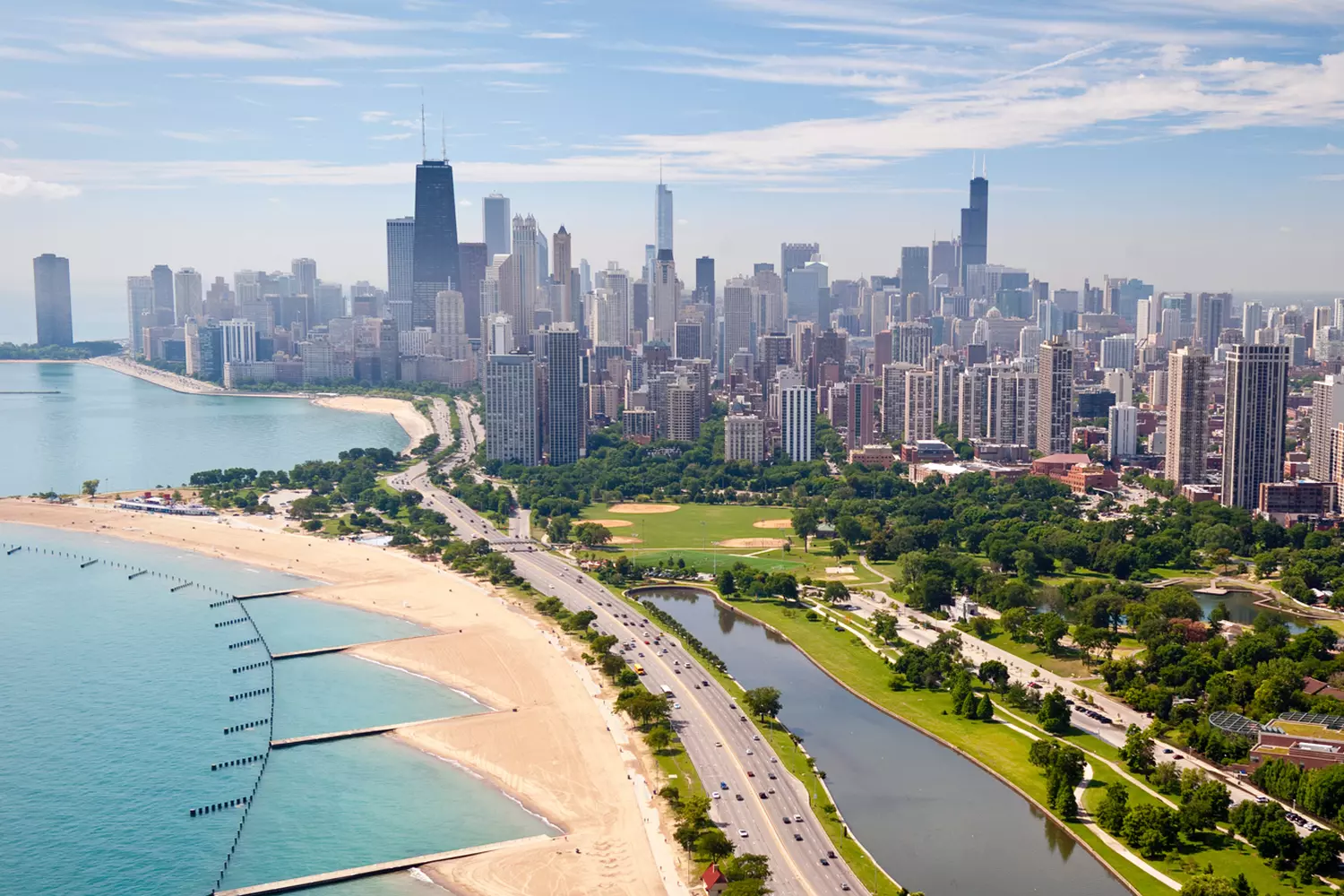 Chicago Skyline Aerial View — Cityscape from Above Aerial view of Chicago city skyline with skyscrapers and Lake Michigan in the background