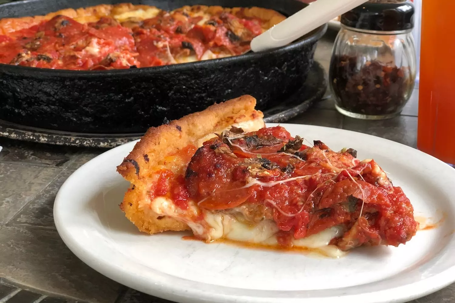 Chicago Deep-Dish Pizza — A Legendary Culinary Icon Classic Chicago deep-dish pizza with thick crust, rich tomato sauce, and melted cheese