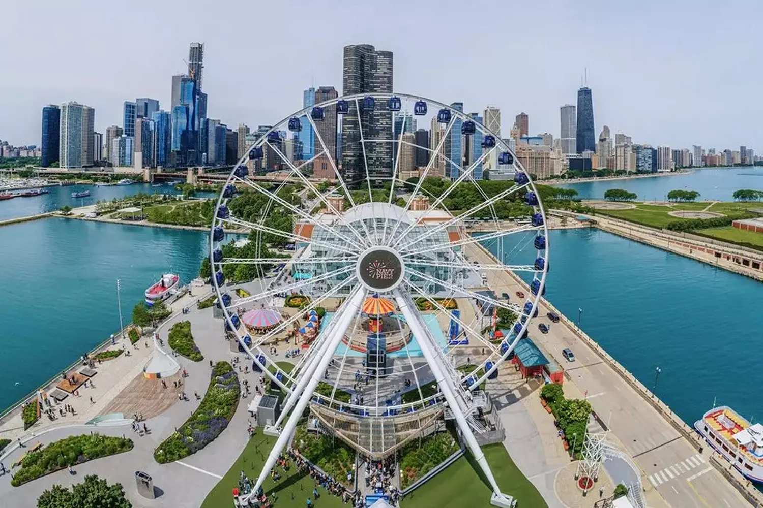 Navy Pier Chicago — Popular Lakefront Entertainment and Tourist Destination View of Navy Pier in Chicago with Ferris wheel, lakefront, and visitors enjoying the attractions