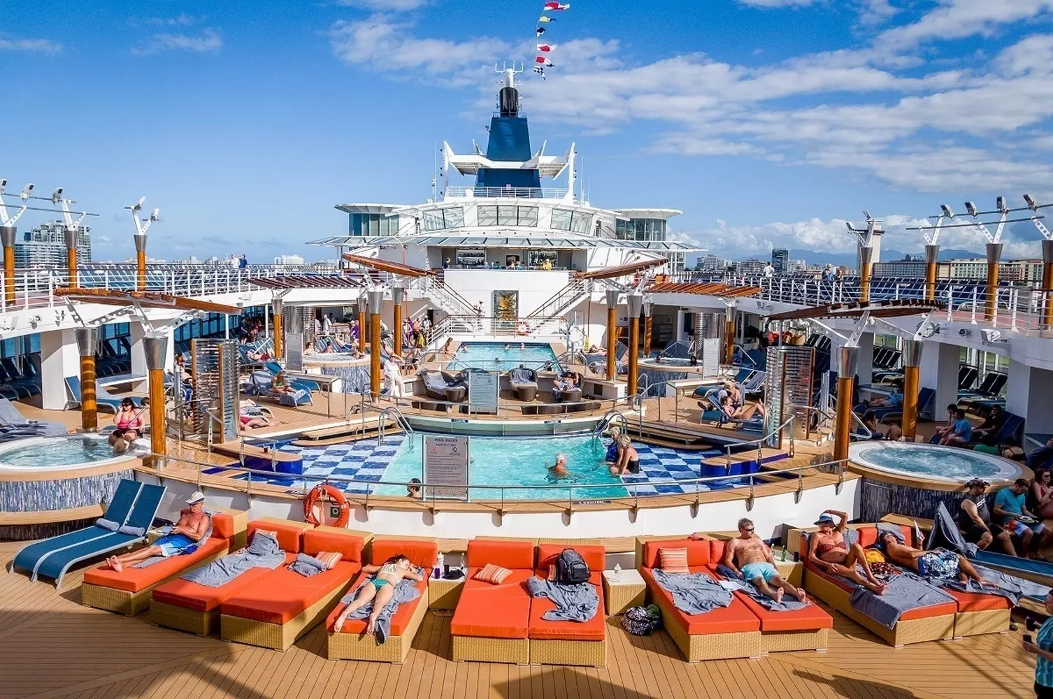 Celebrity Cruises — Modern Luxury and Refined Travel Experience Celebrity Cruises ship sailing near the coast at sunset