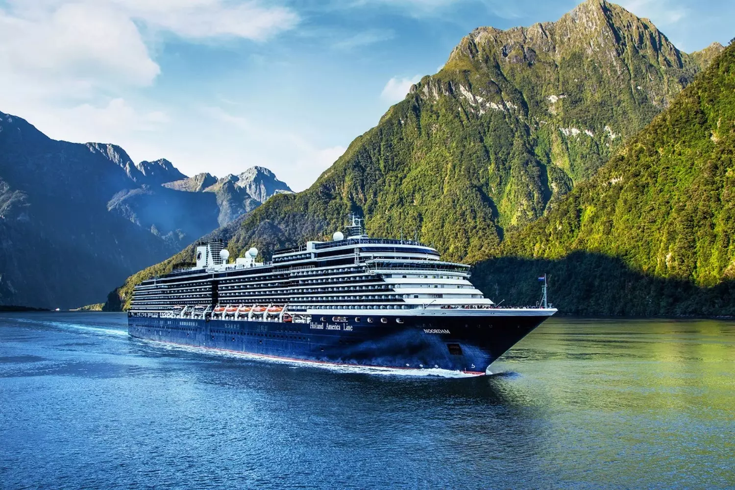 Holland America Line — Timeless Elegance and Unforgettable Journeys Holland America Line ship sailing across the ocean