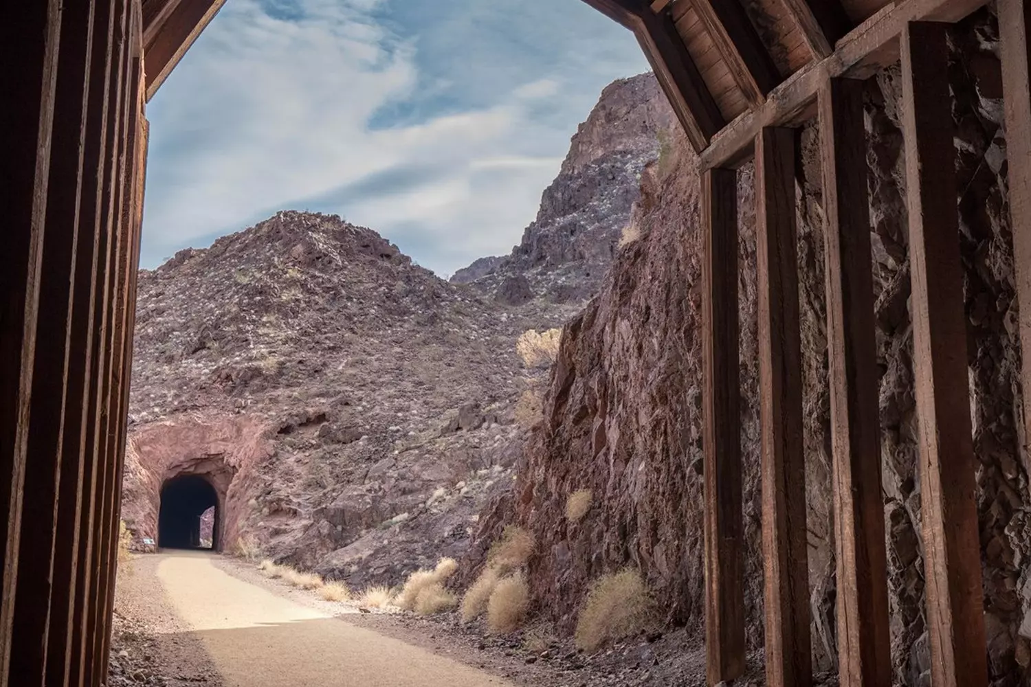 Scenic walk on the Historic Railroad Trail at Lake Mead Hiking trail along the historic railroad near Lake Mead with tunnels and desert views